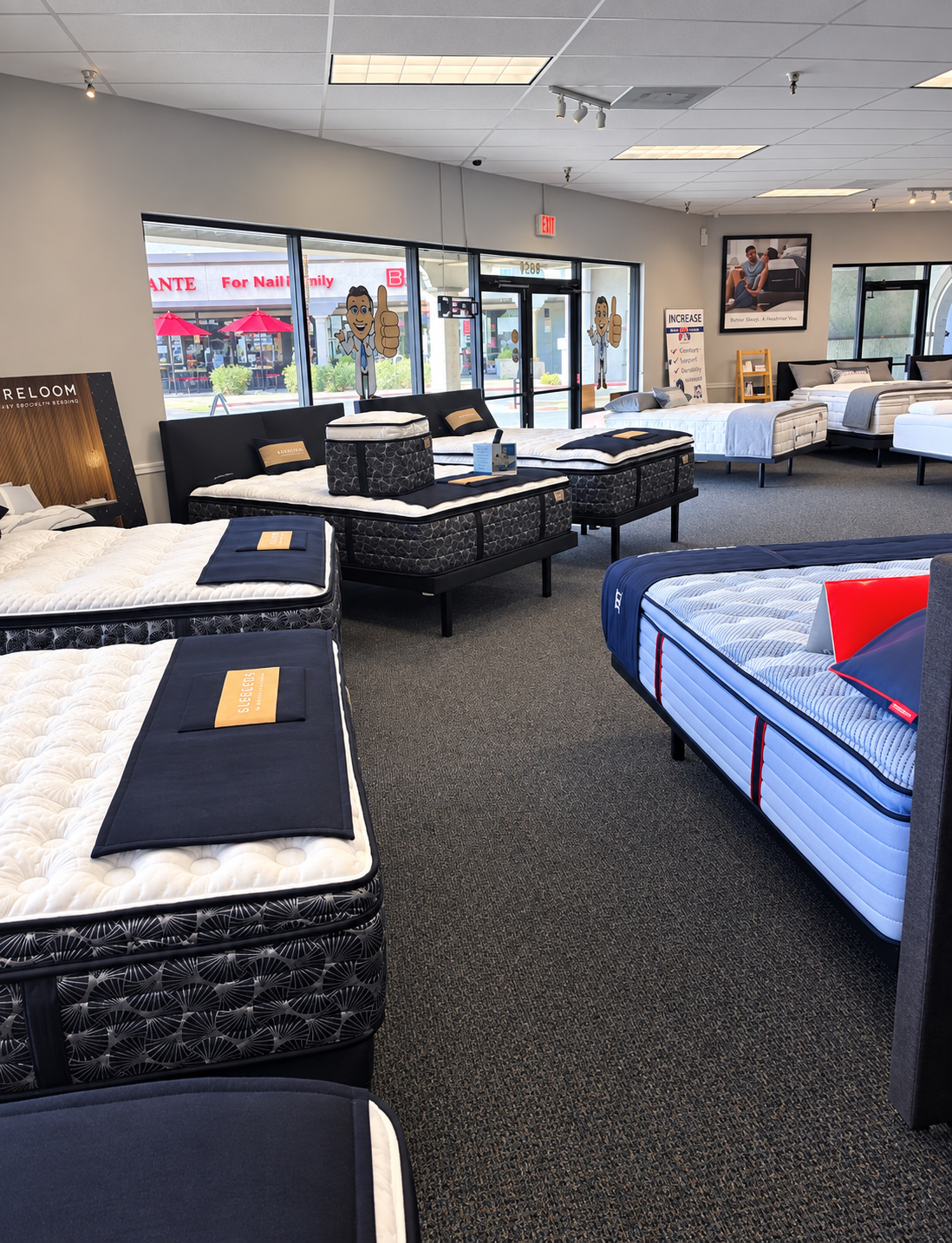 Interior of the Bed DRS North Scottsdale showroom with rows of premium mattresses on display